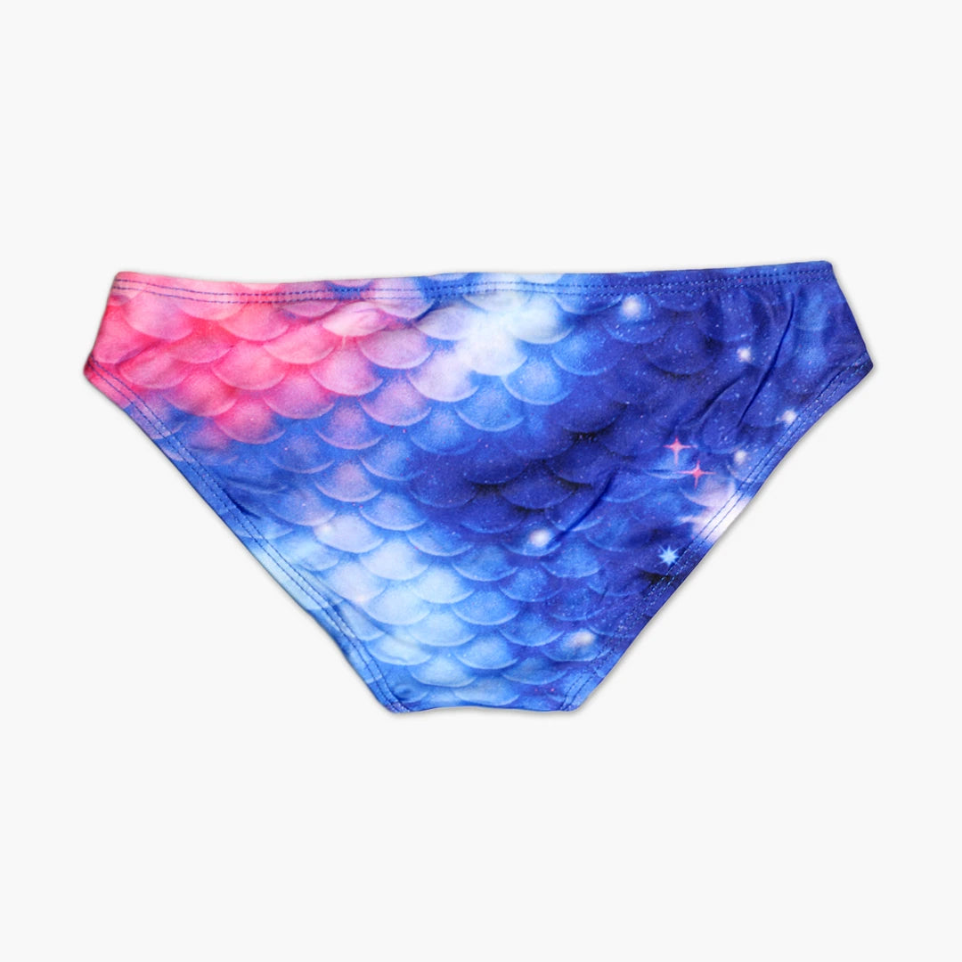 Back view Studio product photography of Bikini bottom featuring a blue and pink galaxy fish scales print, part of the Ocean Queens Lunar Swim Brief collection
