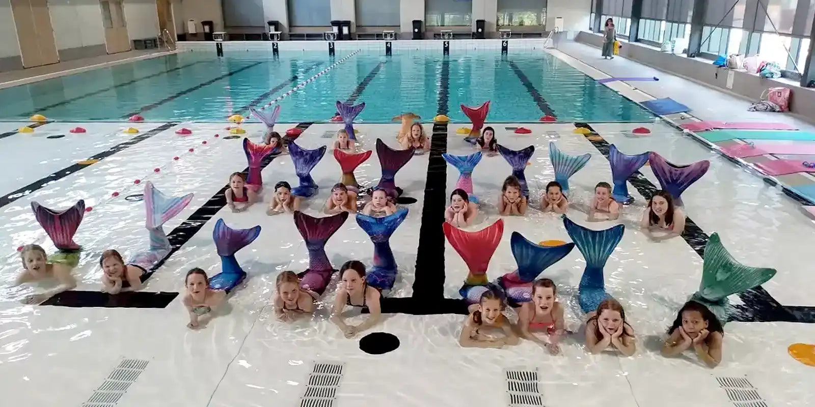 Mermaid Kids in Swimming Pool