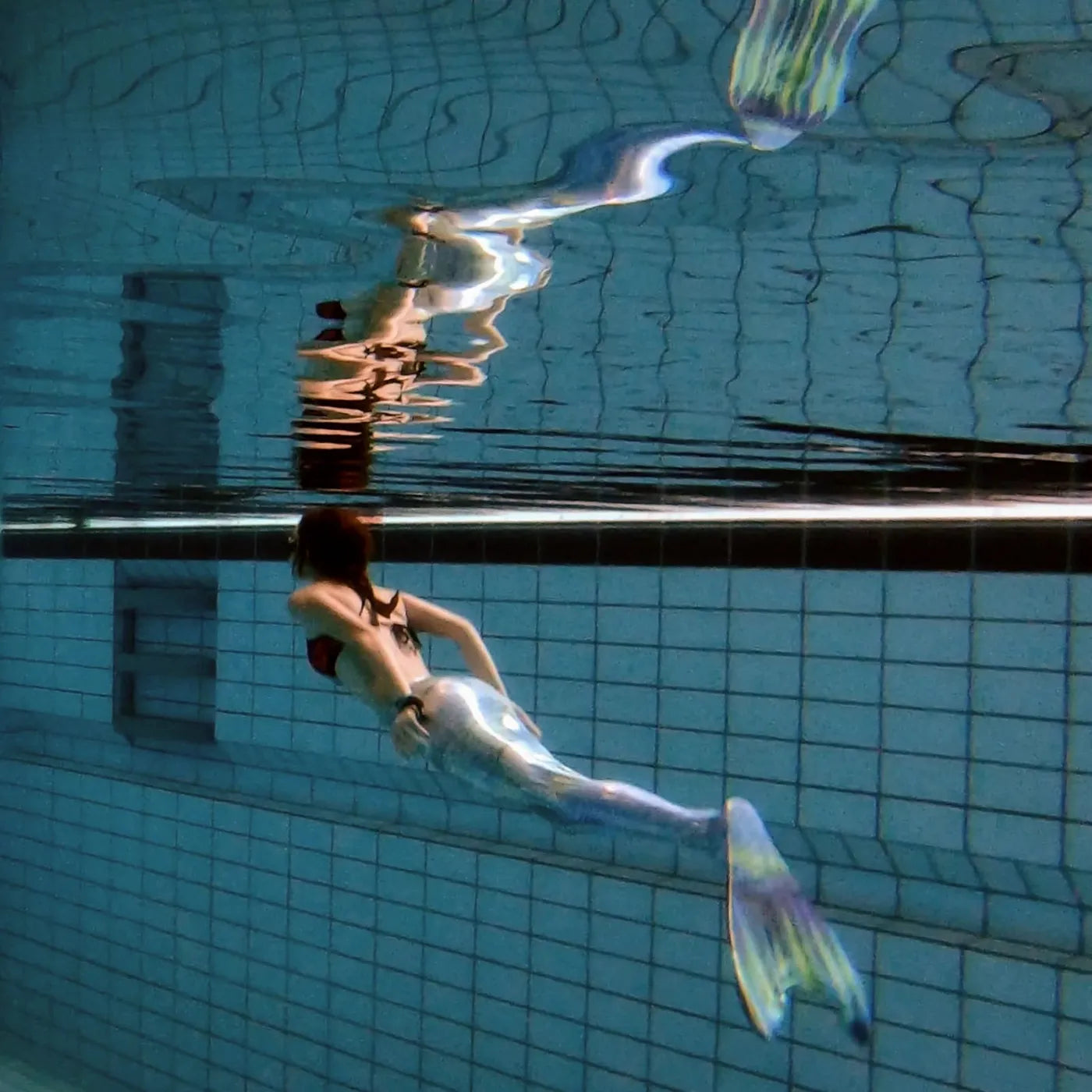 Real Life under water photography of girl with Serena Mermaidtail Ocean Queens om swimming pool